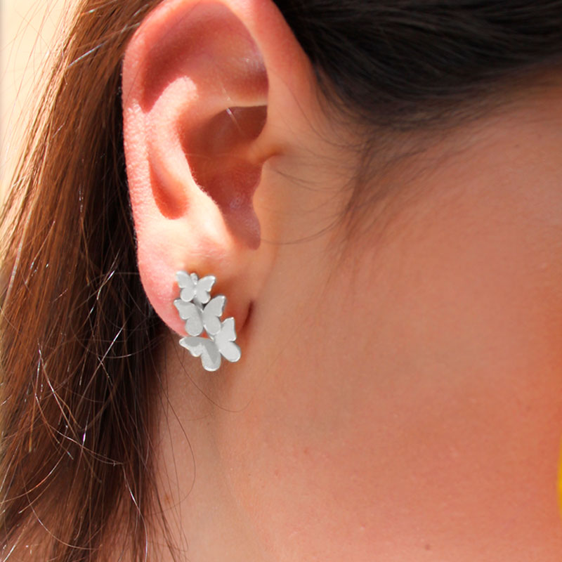 Aretes mariposas triple