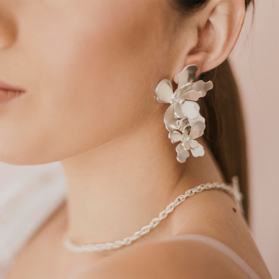 Aretes flor merania largos
