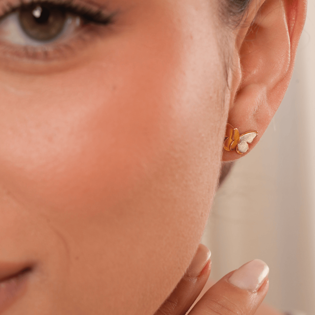 Mi tienda variation Aretes mariposa doble