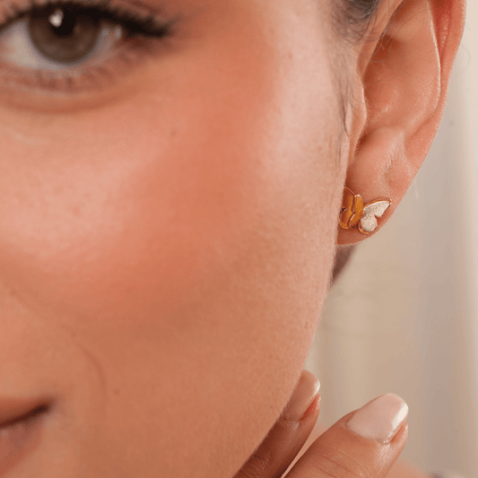 Mi tienda variation Aretes mariposa doble