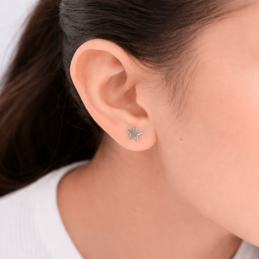 Mi tienda variation Aretes silueta estrella